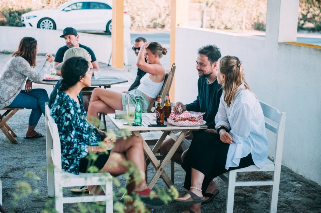 Guests have food outside Ondina Guesthouse