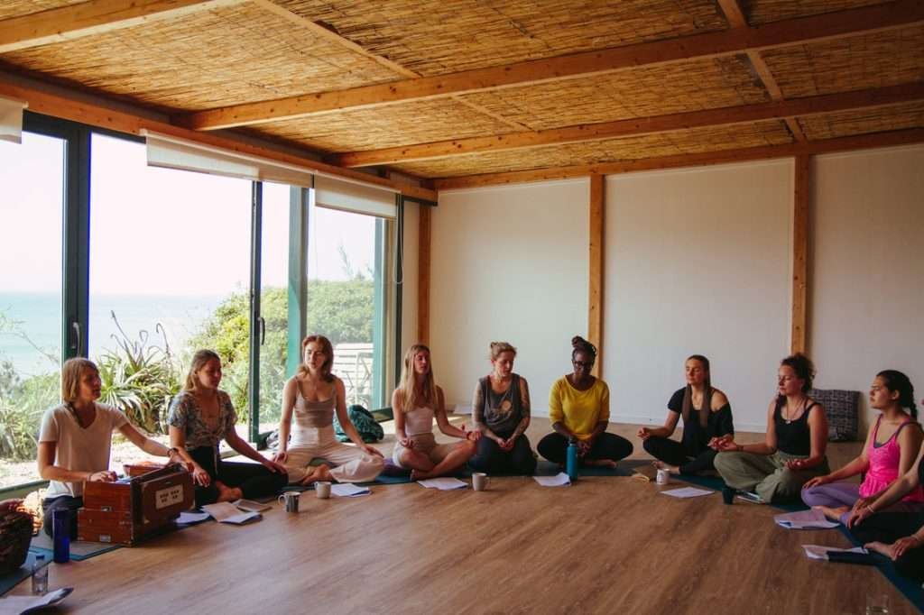 women in a yoga circle