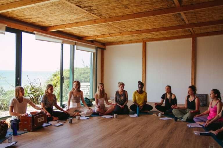 women in a yoga circle